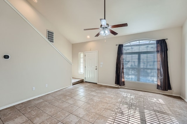 entrance foyer featuring high vaulted ceiling, ceiling fan, and light tile patterned floors