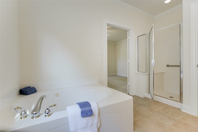 bathroom featuring separate shower and tub, crown molding, and tile patterned floors