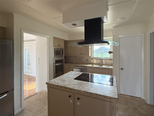 kitchen with tasteful backsplash, sink, island range hood, light hardwood / wood-style flooring, and appliances with stainless steel finishes