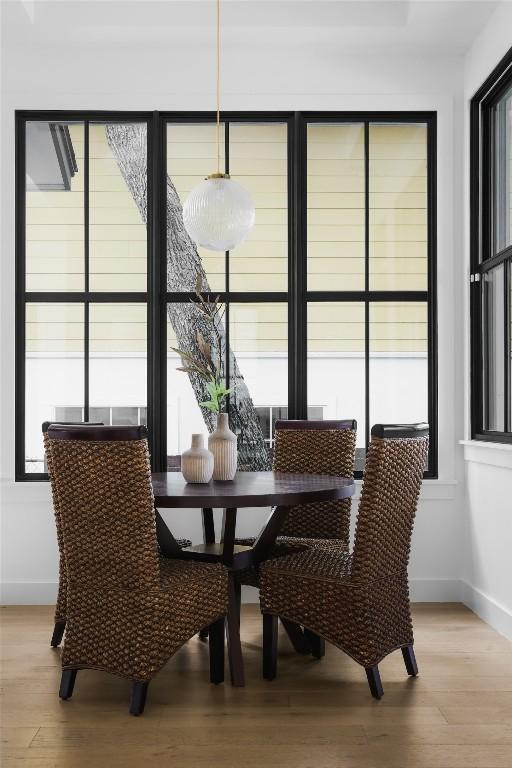 dining area featuring a wealth of natural light and light wood-type flooring