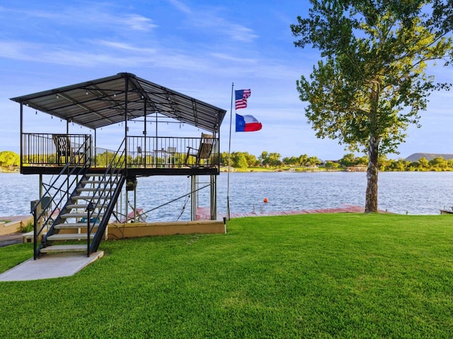 view of dock featuring a water view and a lawn