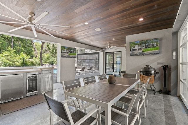 exterior space featuring wine cooler, ceiling fan, and wood ceiling