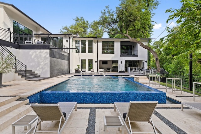 view of pool with a patio