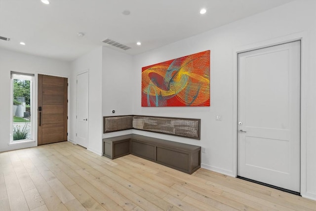 foyer featuring recessed lighting, visible vents, and light wood-style flooring