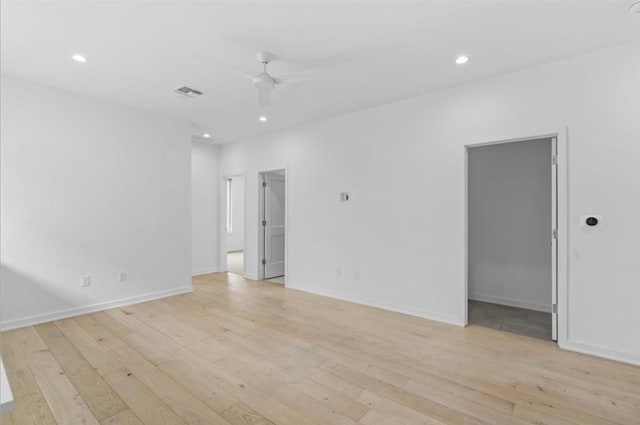 spare room featuring light hardwood / wood-style floors