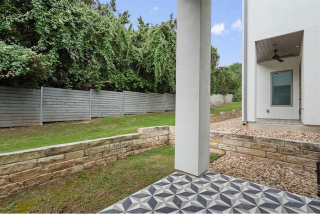 view of patio / terrace with a ceiling fan and a fenced backyard