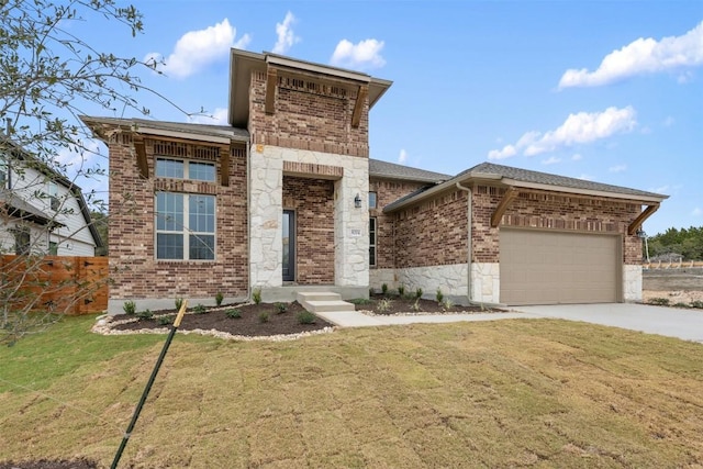 view of front of house featuring a garage and a front yard