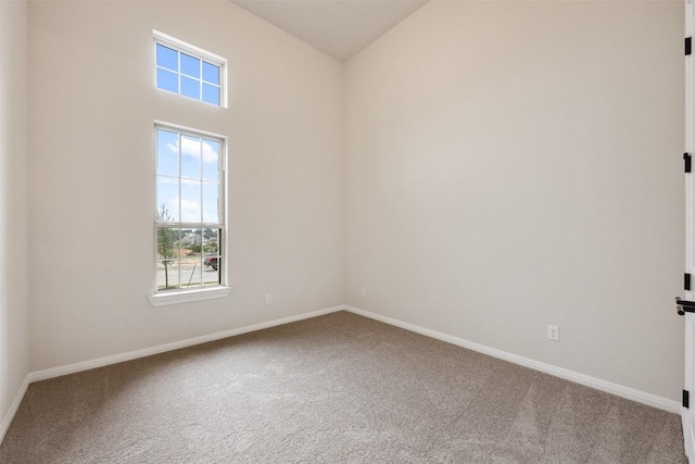 empty room featuring carpet flooring