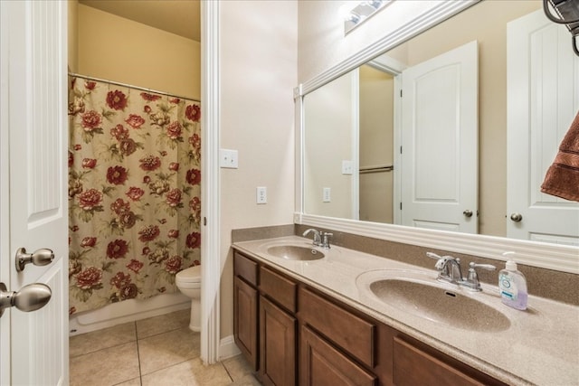 full bathroom featuring tile patterned flooring, vanity, shower / bath combination with curtain, and toilet