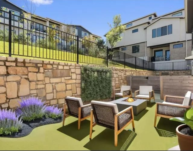 2050 Lohmans Spur Unit 603, Austin, TX 78734 - view of patio with a fire pit