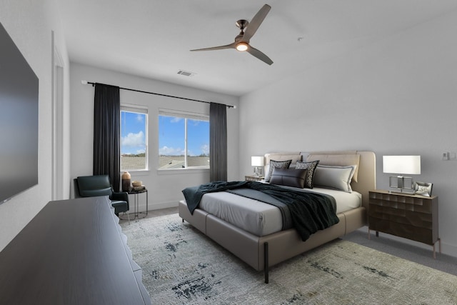 2050 Lohmans Spur Unit 603, Austin, TX 78734 - bedroom with carpet, baseboards, and a ceiling fan