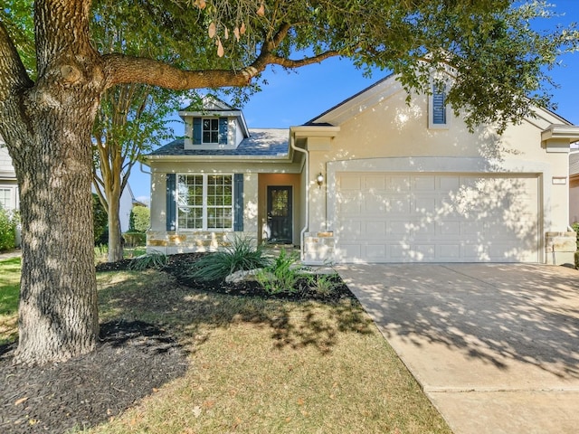 view of front of property with a front lawn