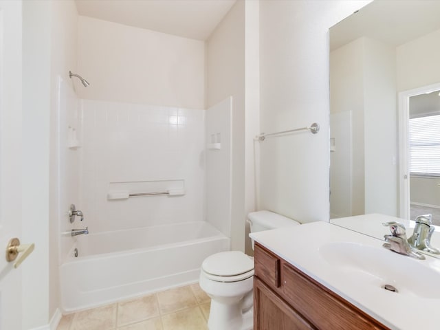 full bathroom featuring vanity, tile patterned flooring, toilet, and shower / washtub combination