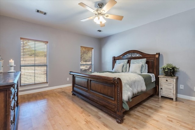 bedroom featuring ceiling fan and light hardwood / wood-style flooring