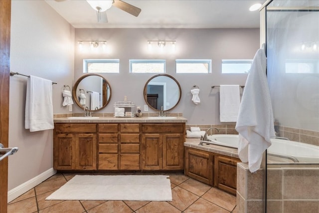 bathroom featuring independent shower and bath, vanity, tile patterned flooring, and ceiling fan