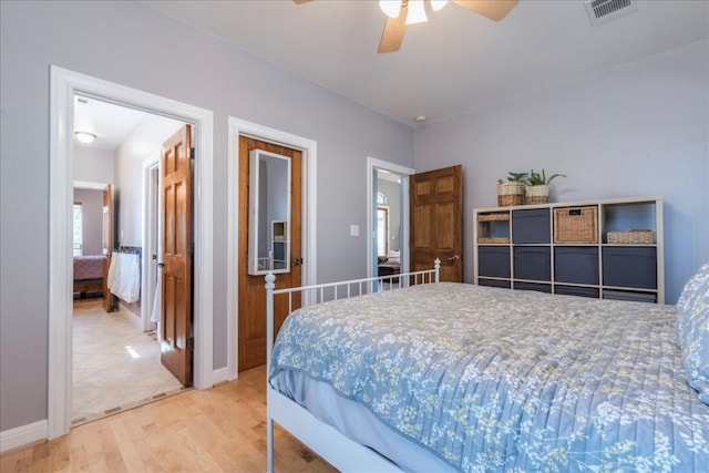 bedroom with ceiling fan and light wood-type flooring