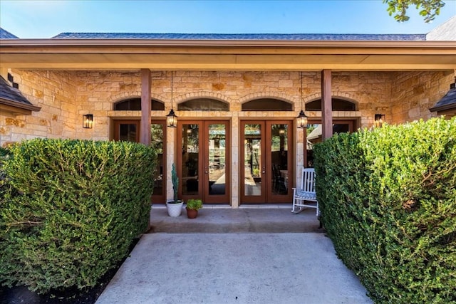 31887 Mirela Ann Ln, Dripping Springs, TX 78620 - entrance to property featuring stone siding and french doors
