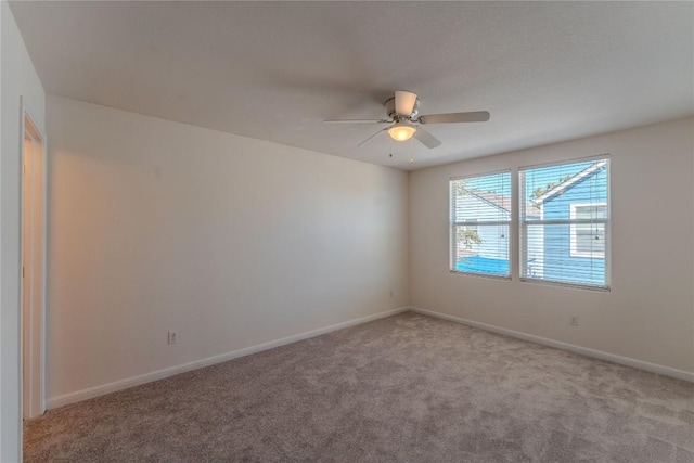 418 Shadow Pt, San Marcos, TX 78666 - empty room with ceiling fan, light carpet, and baseboards