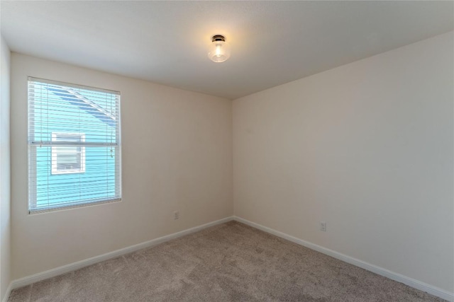 418 Shadow Pt, San Marcos, TX 78666 - spare room featuring light colored carpet and baseboards