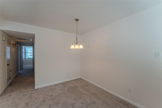 418 Shadow Pt, San Marcos, TX 78666 - empty room with a chandelier, baseboards, and light colored carpet