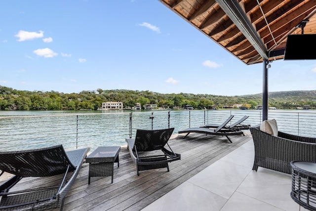 dock area with a water view