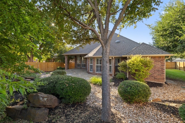 back of house featuring a patio