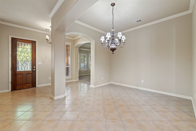 interior space featuring a notable chandelier, ornamental molding, and a wealth of natural light