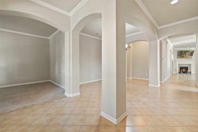 unfurnished room with light carpet and ornamental molding