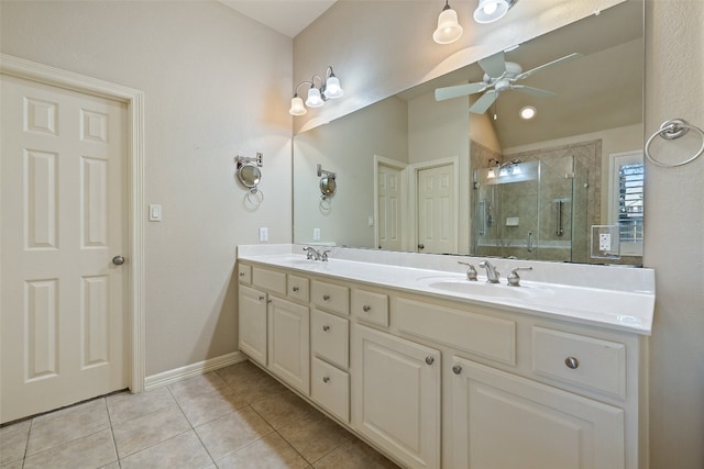 bathroom featuring vanity, tile patterned flooring, lofted ceiling, ceiling fan, and an enclosed shower