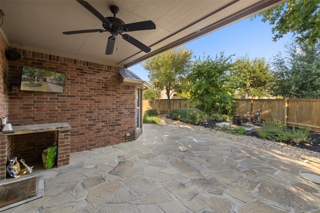 view of patio with ceiling fan