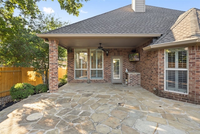 view of patio featuring ceiling fan