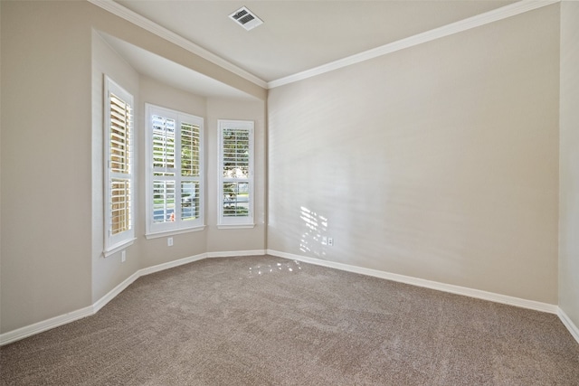 unfurnished room featuring carpet floors and ornamental molding