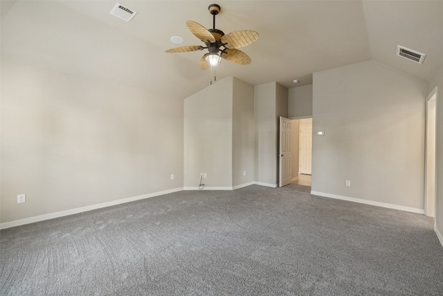 carpeted empty room with ceiling fan and lofted ceiling