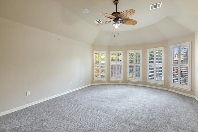 carpeted empty room with lofted ceiling and ceiling fan