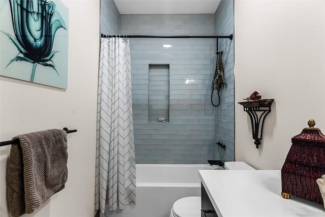 full bathroom with vanity, toilet, and shower / tub combo with curtain