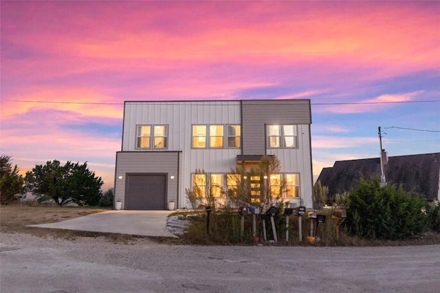 view of front of property with a garage