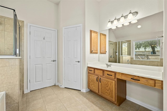 13108 Craven Ln, Manor, TX 78653 - full bathroom with a shower stall, tile patterned floors, vanity, and baseboards