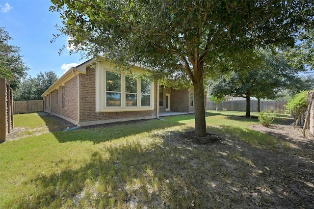 13108 Craven Ln, Manor, TX 78653 - back of house with brick siding