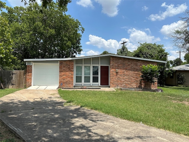 ranch-style house with a front lawn and a garage