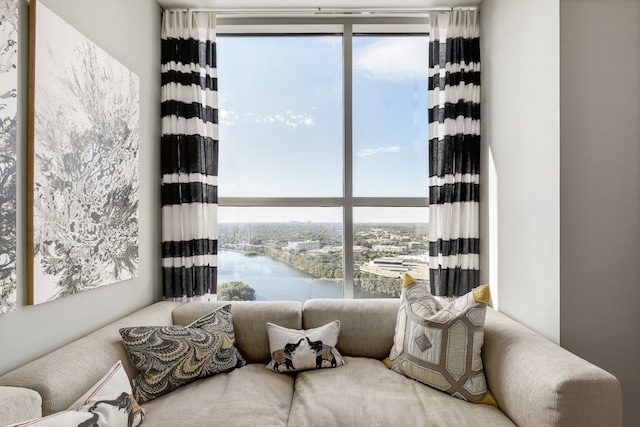 interior space featuring a water view and plenty of natural light