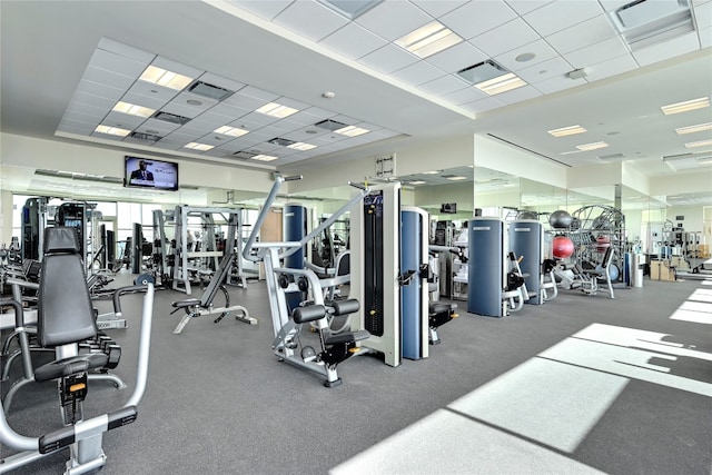 gym featuring a drop ceiling