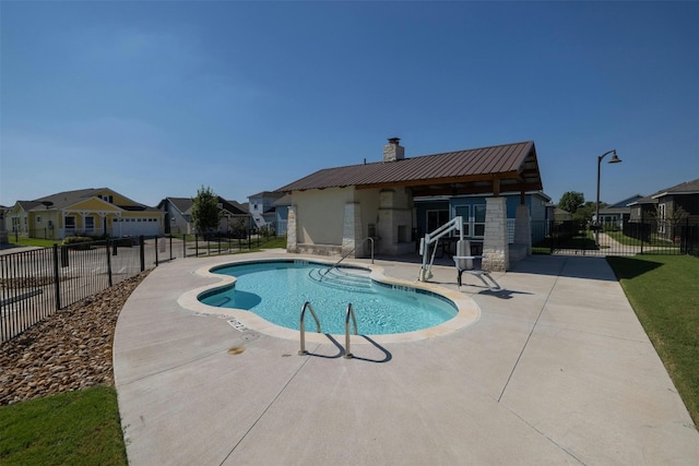 view of pool with a patio