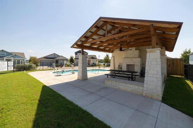 3017 Settlement Dr Unit 30, Round Rock, TX 78665 - view of swimming pool with an outdoor stone fireplace, a patio area, and a gazebo