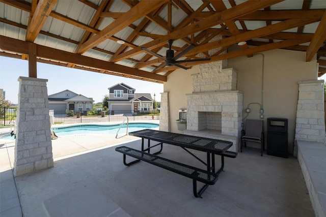 3017 Settlement Dr Unit 30, Round Rock, TX 78665 - view of patio / terrace featuring an outdoor stone fireplace and a ceiling fan