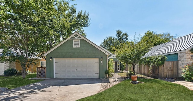 exterior space with a garage and a front yard