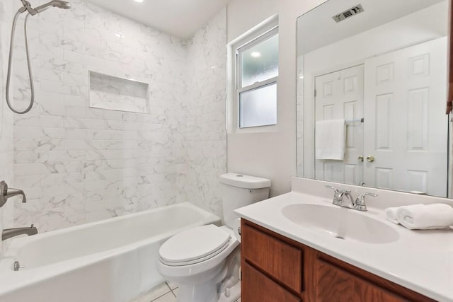 full bathroom featuring vanity, toilet, and tiled shower / bath combo