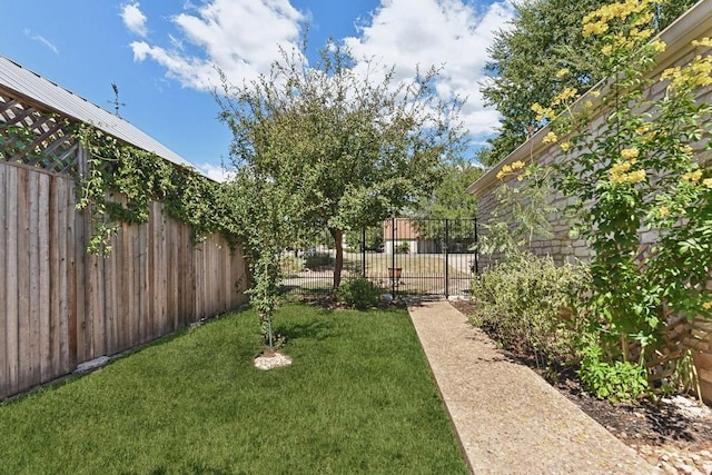 view of yard featuring fence