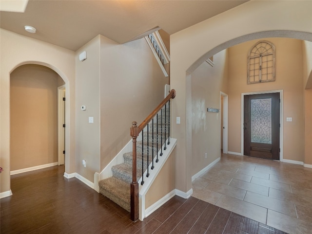 foyer entrance with hardwood / wood-style floors