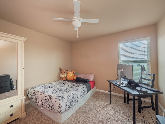 bedroom with ceiling fan and carpet flooring