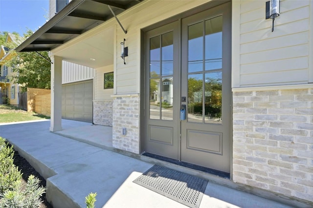 property entrance featuring a garage